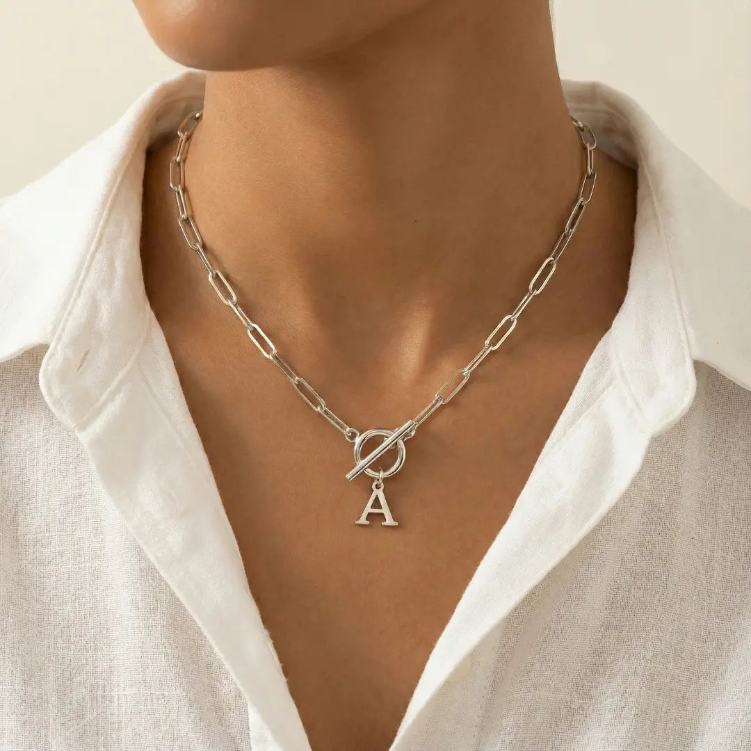 Gliederkette mit Initiale