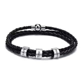 Lederarmband mit Gravur für Herren in Schwarz mit gravierten Edelstahl-Ringen und Namen